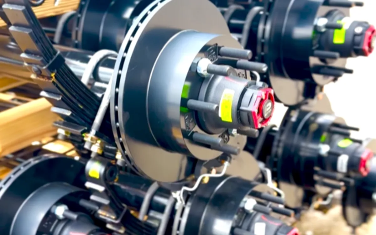 Close-up of trailer disc brake rotors and hub assemblies
