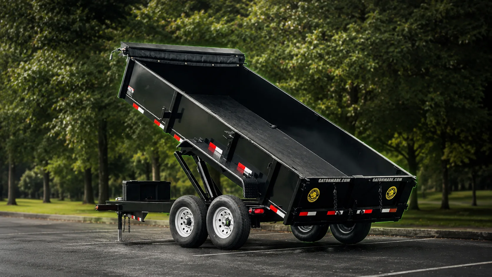 Gatormade dump trailer with the bed raised, built to order at the factory
